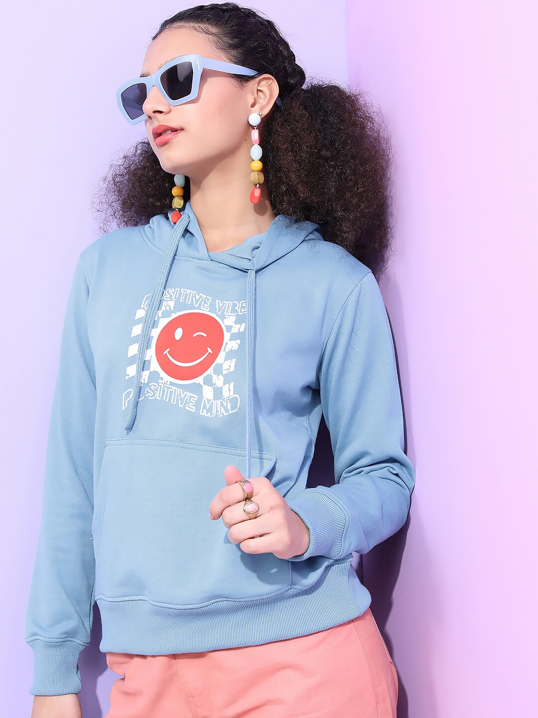 

Tokyo Talkies Women Blue Printed Hooded Sweatshirt