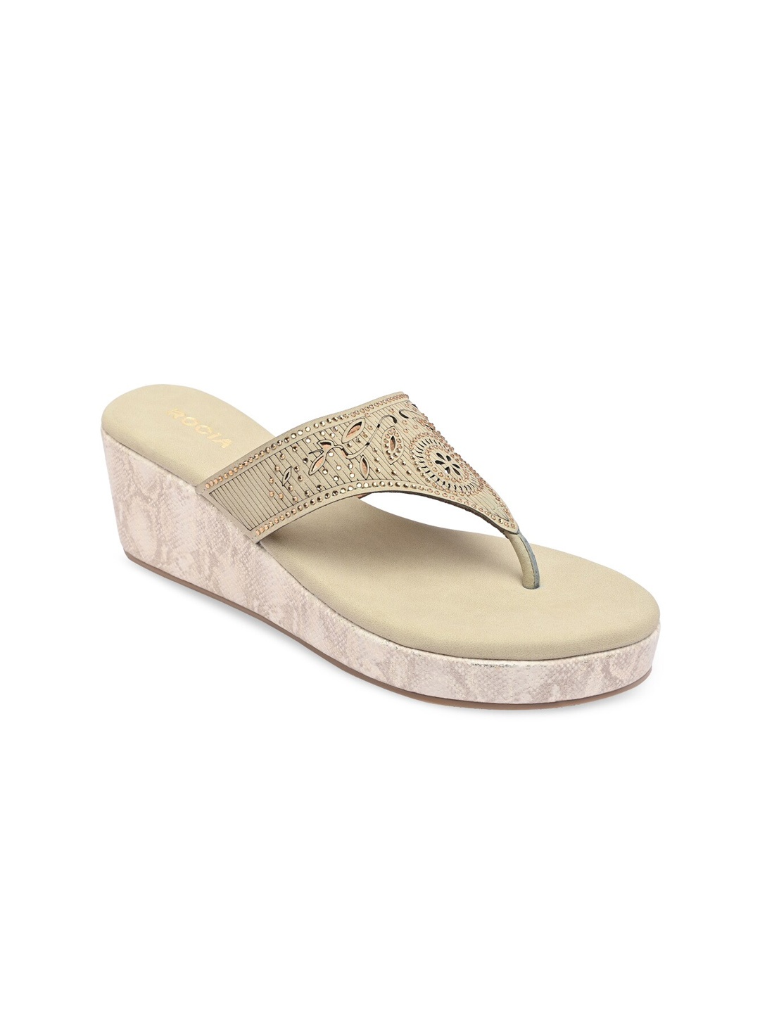 

Rocia Beige Ethnic Laser Cut Wedge Heels
