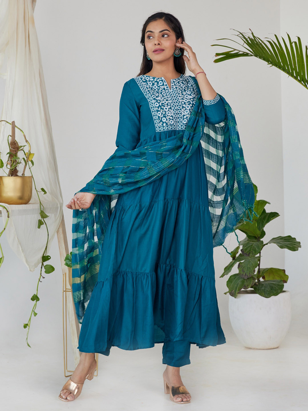 

HERE&NOW Women Teal Floral Embroidered Thread Work Kurta with Trousers & With Dupatta