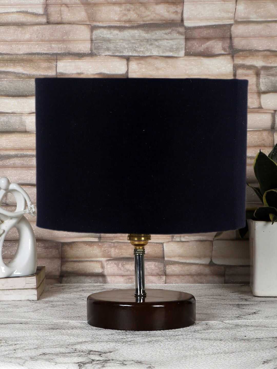 

Devansh Black Solid Cylindrical Table Lamp