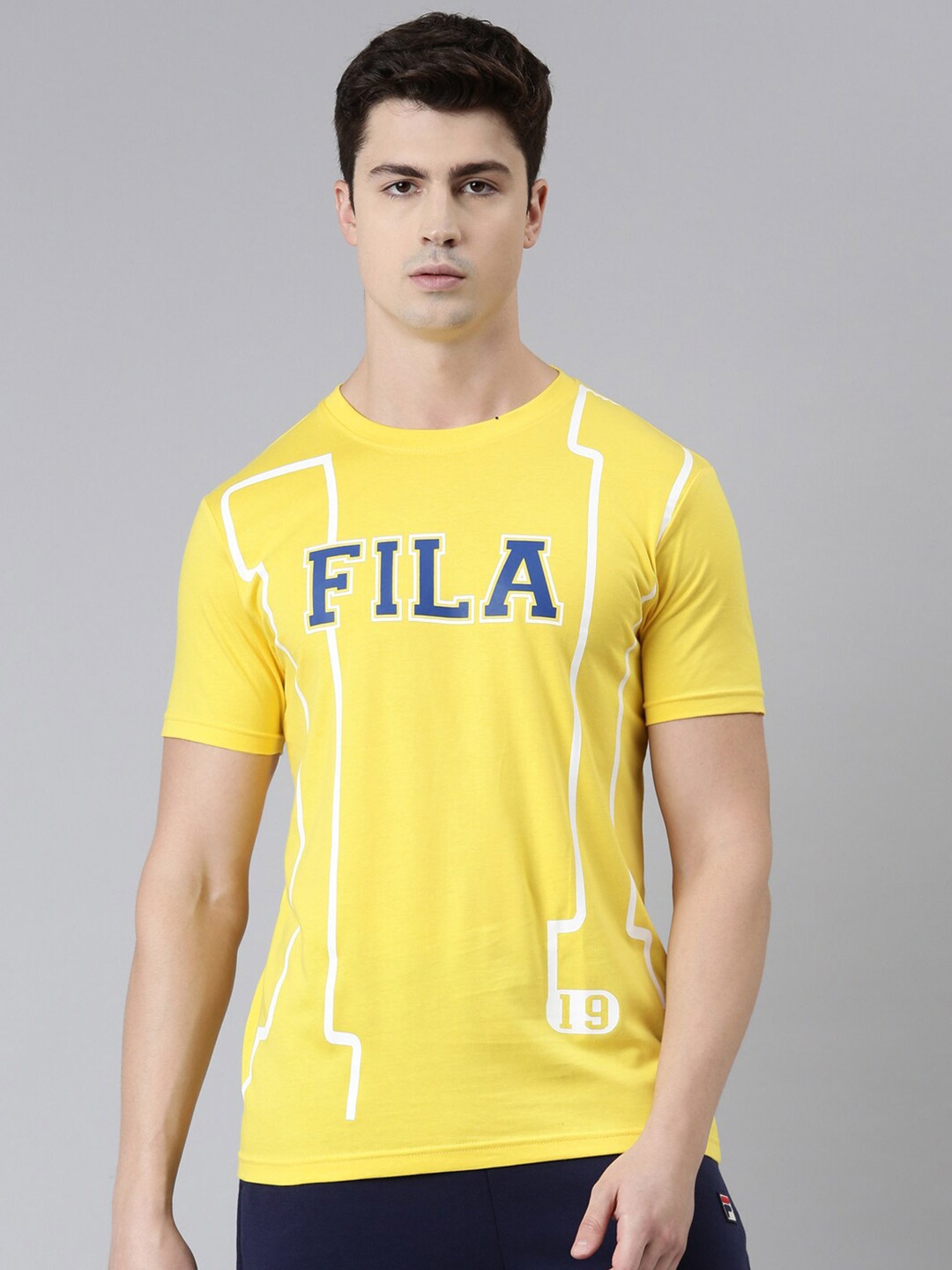

FILA Men Yellow Typography Printed Organic Cotton T-shirt