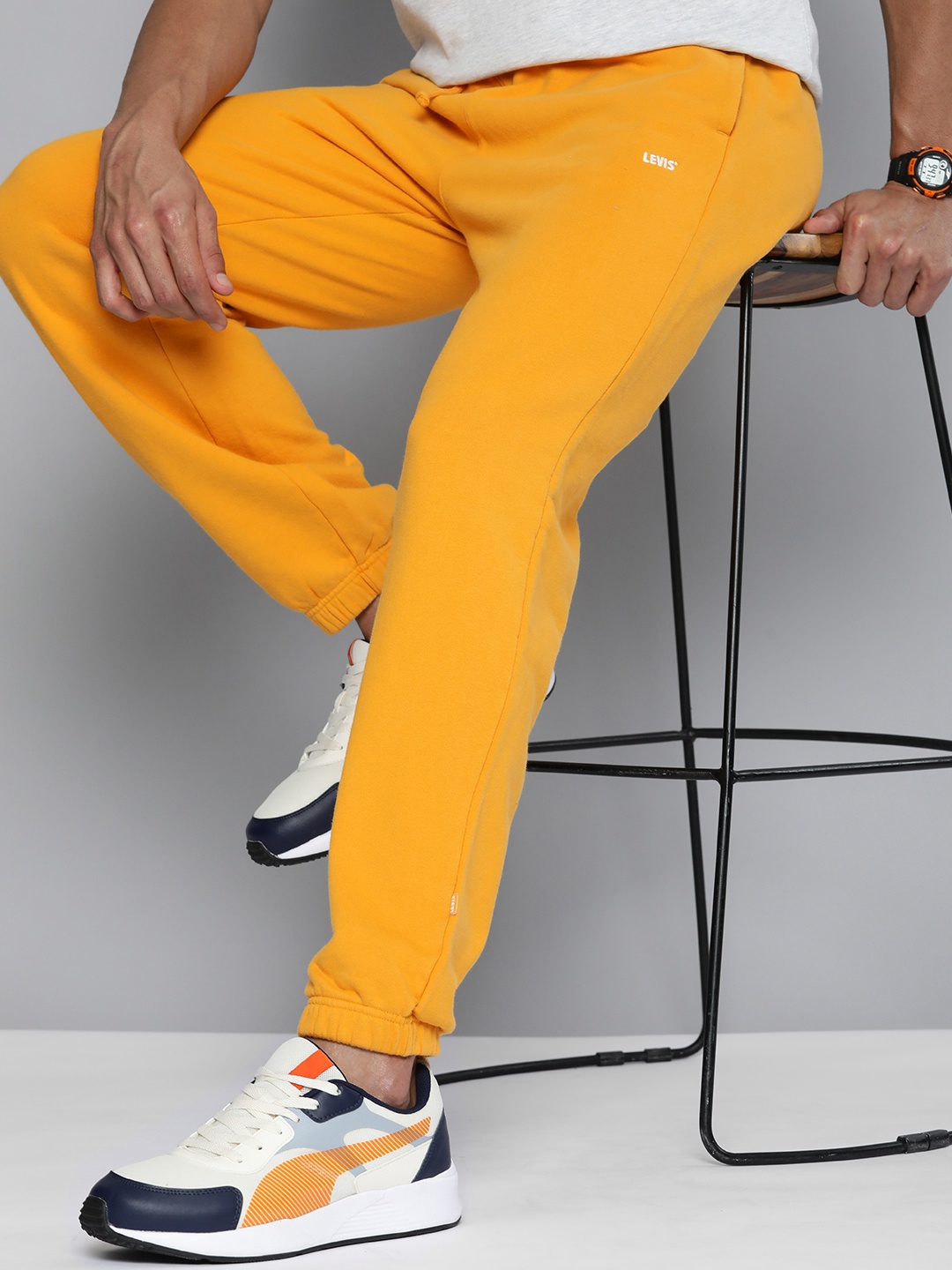 

Levis Men Solid Pure Cotton Joggers, Yellow