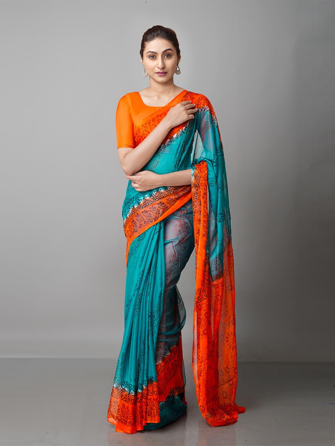 

Unnati Silks Green & Orange Ethnic Motifs Block Print Saree