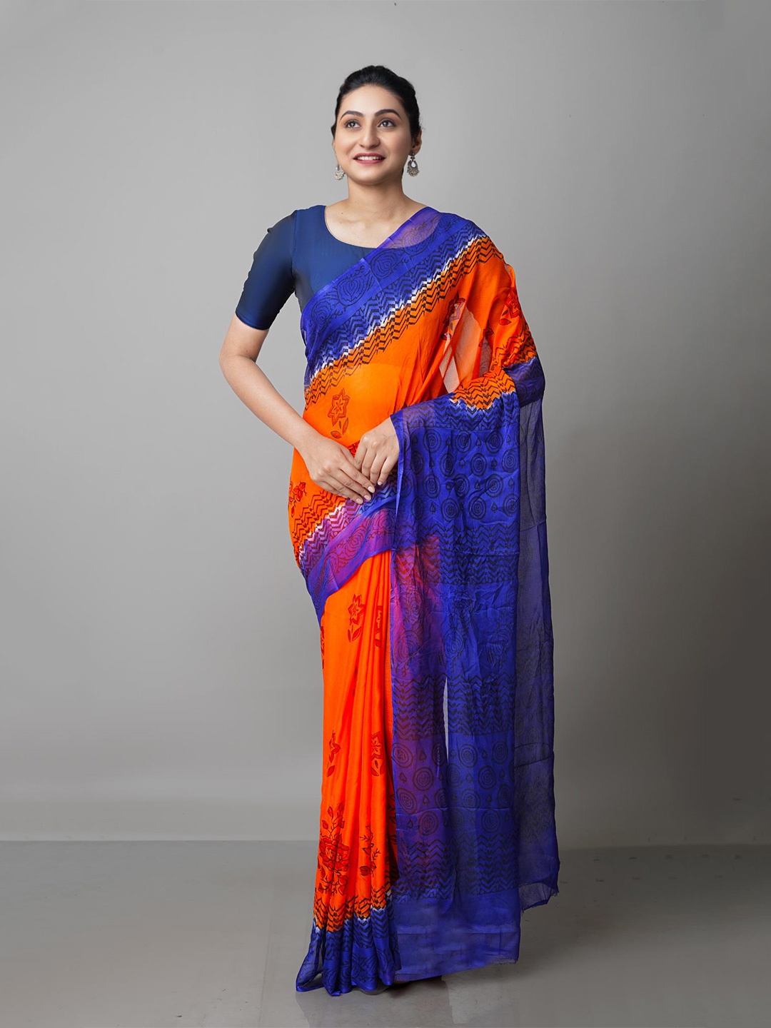 

Unnati Silks Orange & Blue Ethnic Motifs Block Print Saree