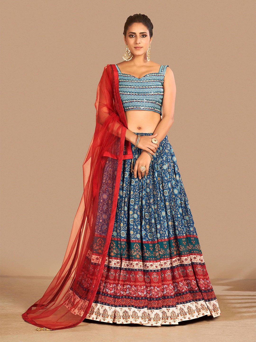 

Fusionic Blue & Red Embroidered Semi-Stitched Lehenga & Unstitched Blouse With Dupatta