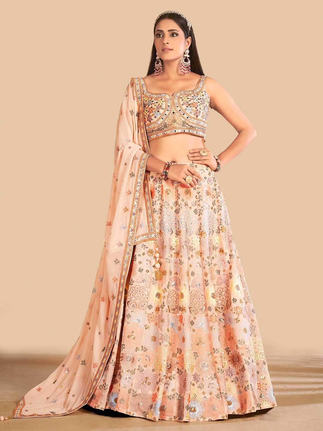 

Fusionic Peach-Coloured & Orange Embroidered Semi-Stitched Lehenga & Unstitched Blouse With Dupatta