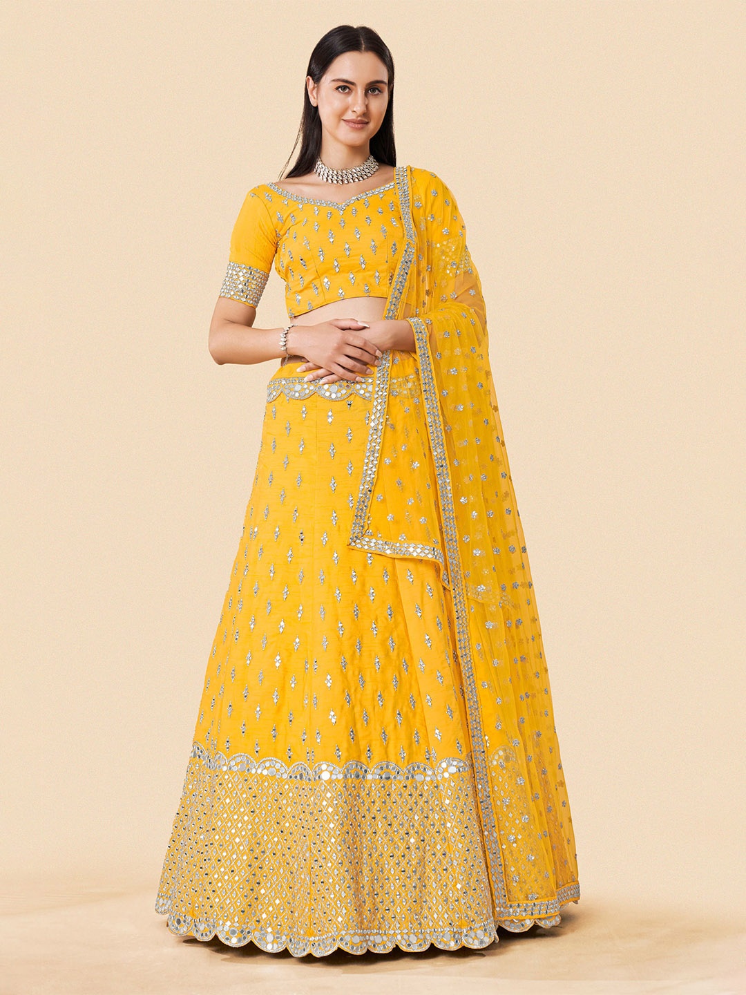

Fusionic Yellow & Gold Embroidered Mirror Work Semi Stitched Lehenga & Blouse With Dupatta