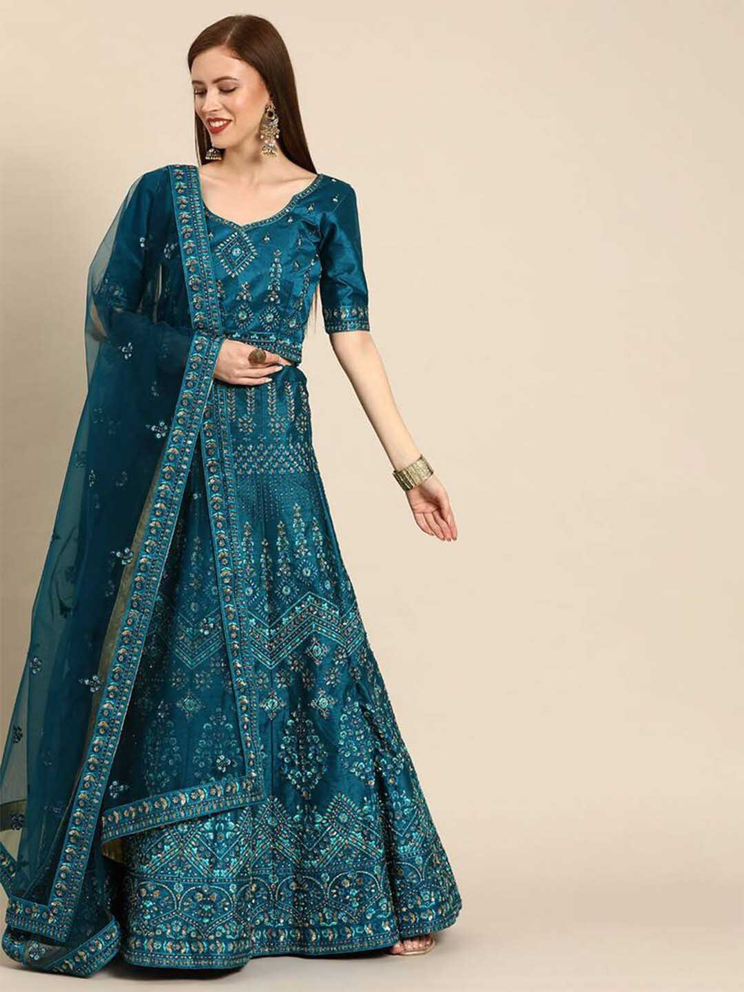 

Fusionic Teal & Gold-Toned Embroidered Thread Work Semi-Stitched Lehenga & Unstitched Blouse With Dupatta
