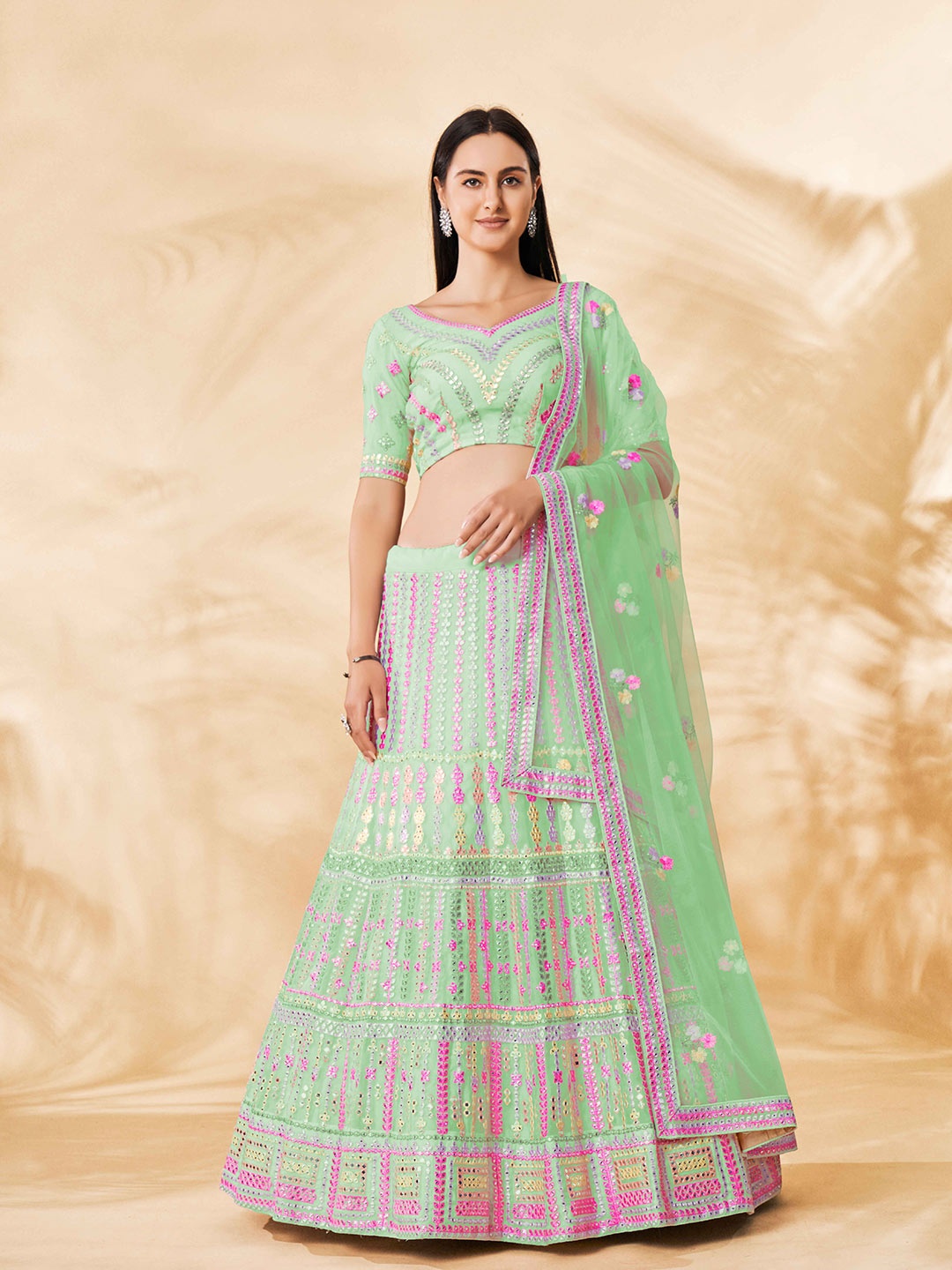 

Fusionic Green & Pink Embroidered Thread Work Semi-Stitched Lehenga & Unstitched Blouse With Dupatta