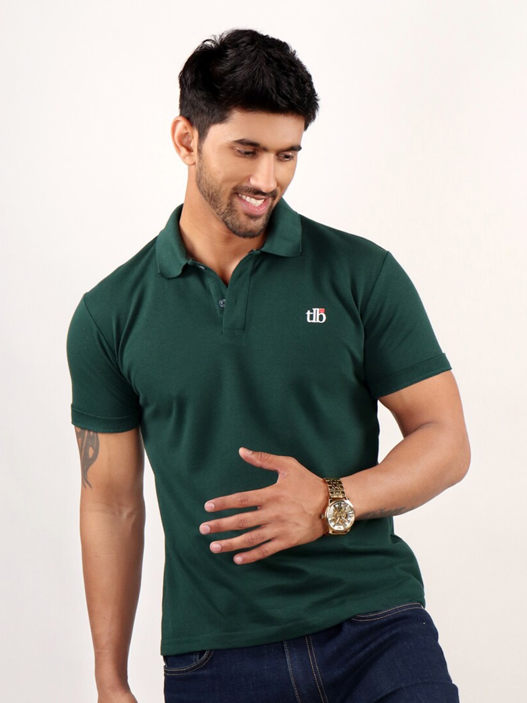 

The Label Bar Men Green Solid Polo Collar T-shirt