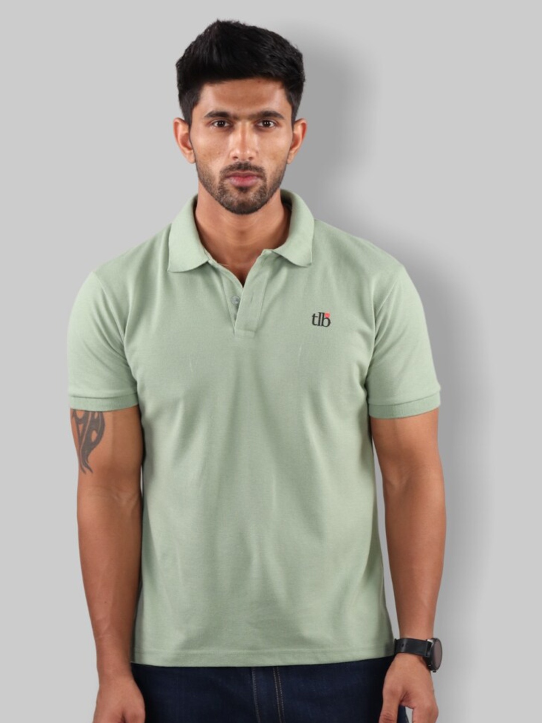 

The Label Bar Men Green Solid Polo Collar T-shirt