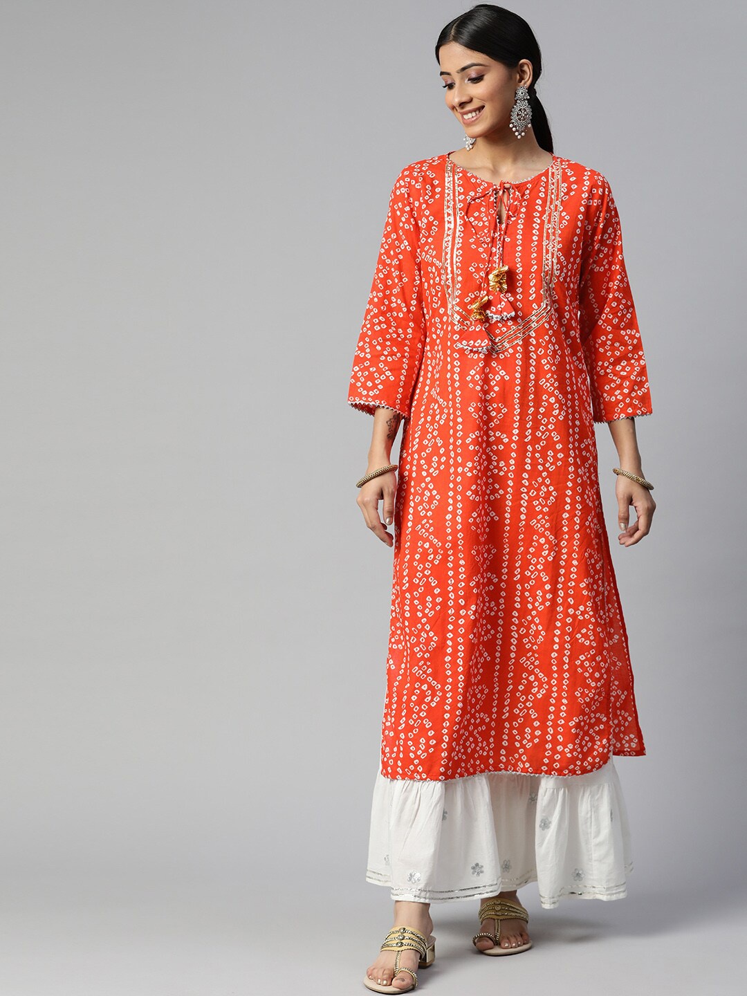 

IRIDAA JAIPUR Women Orange Ethnic Motifs Printed Gotta Patti Pure Cotton Kurta with Sharara