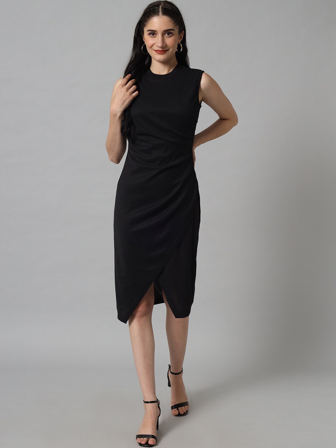 

The Vanca Women Black Solid Sheath Dress