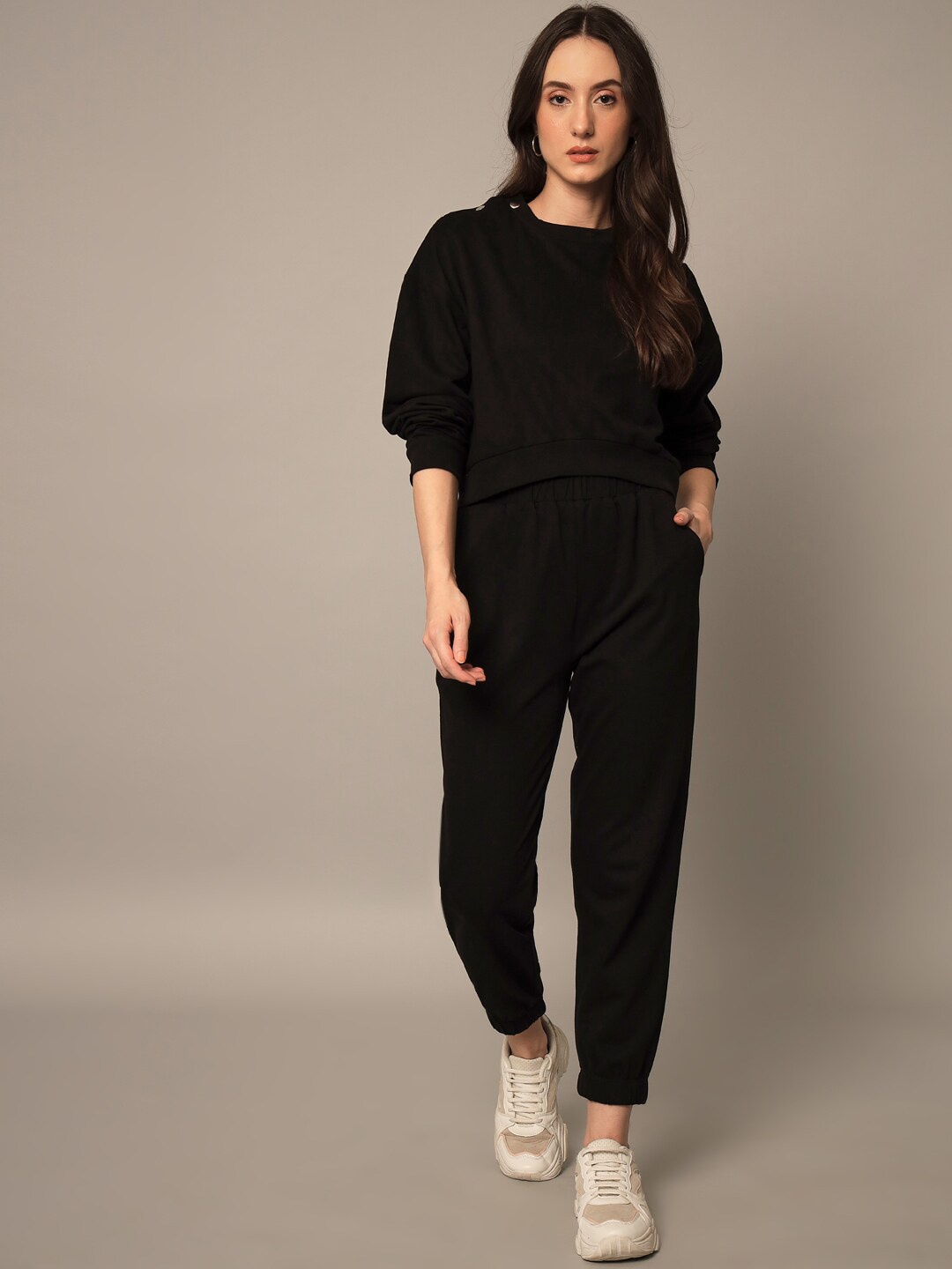 

Yaadleen Women Black Solid Cotton Tracksuits