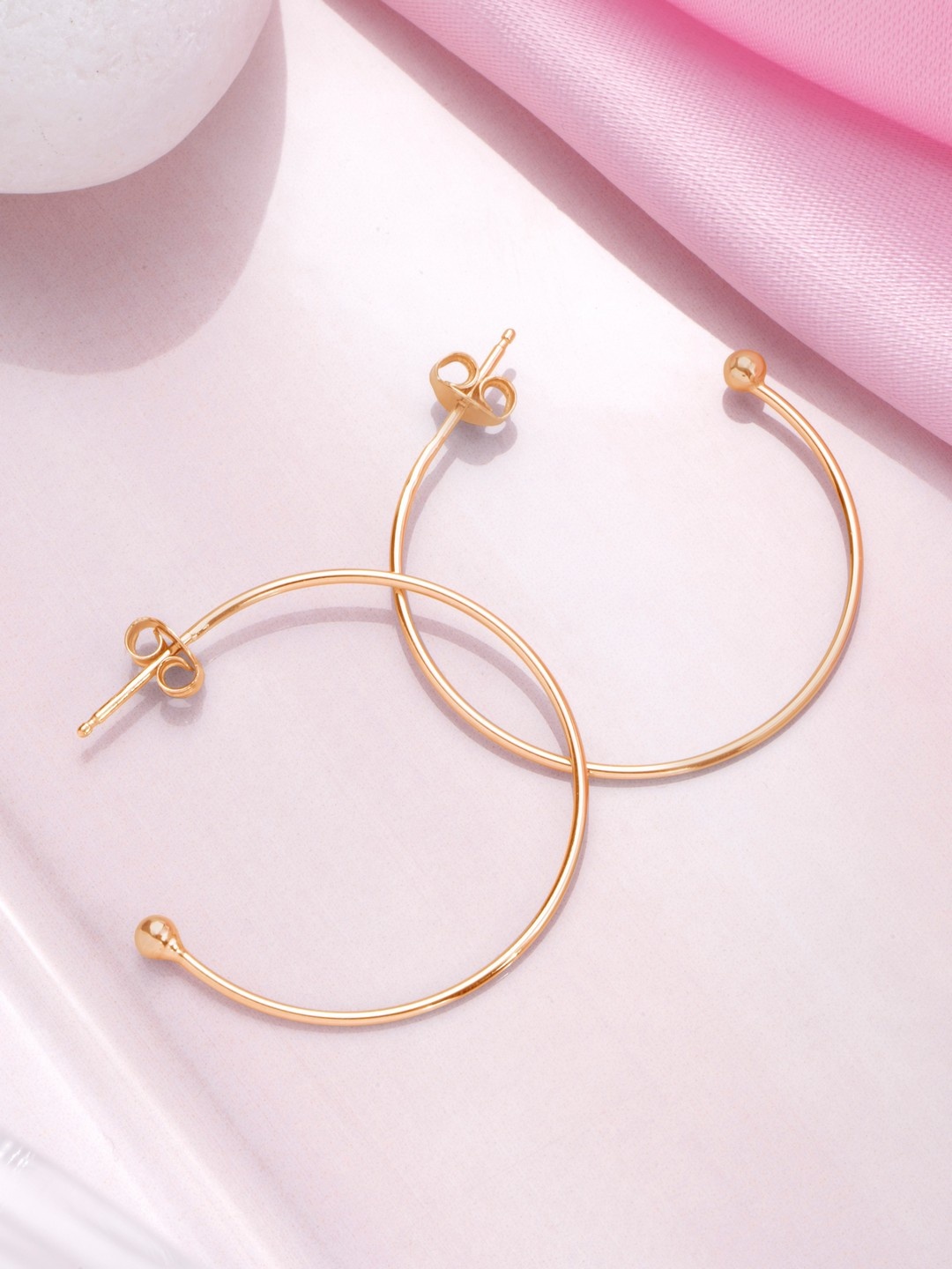 

Zavya Rose Gold Circular Half Hoop Earrings