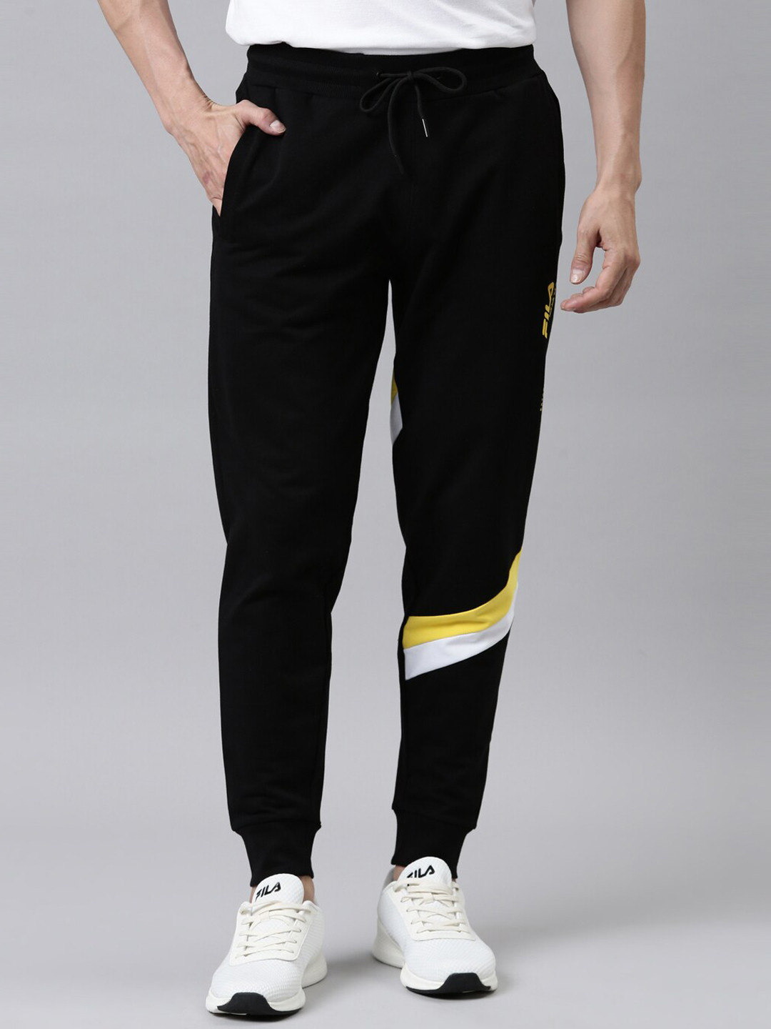 

FILA Men Black & Yellow Solid Joggers