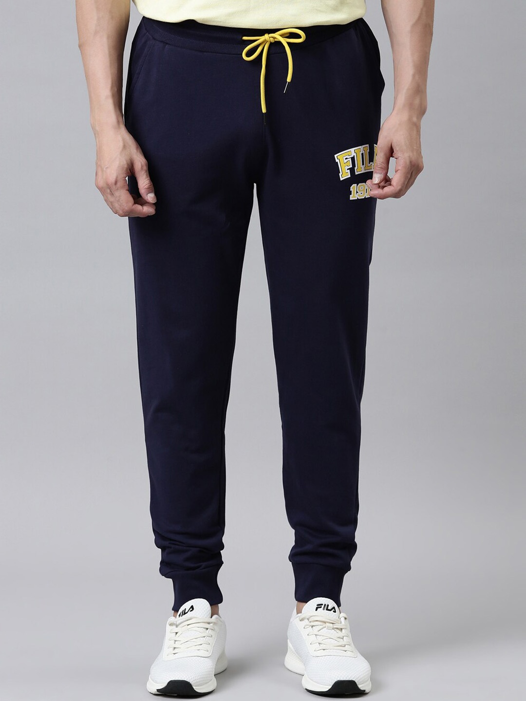 

FILA Men Blue Solid SUGA PEA Joggers