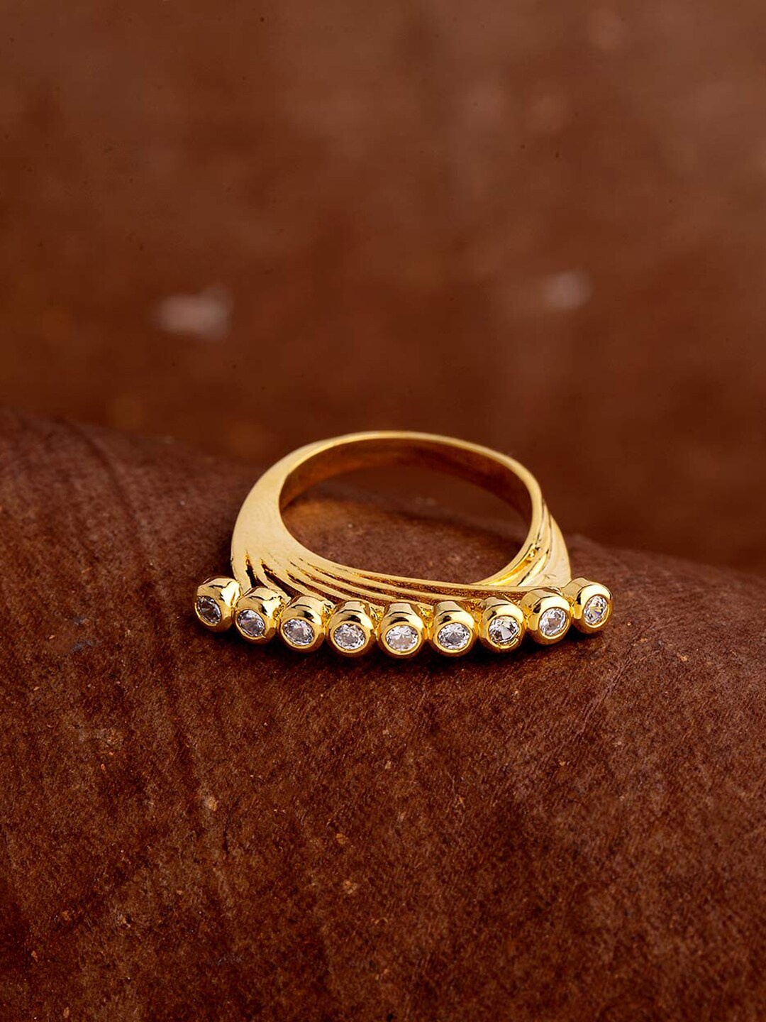 

Voylla Women Gold-Plated White Round Stone Studded & Beaded Finger Ring