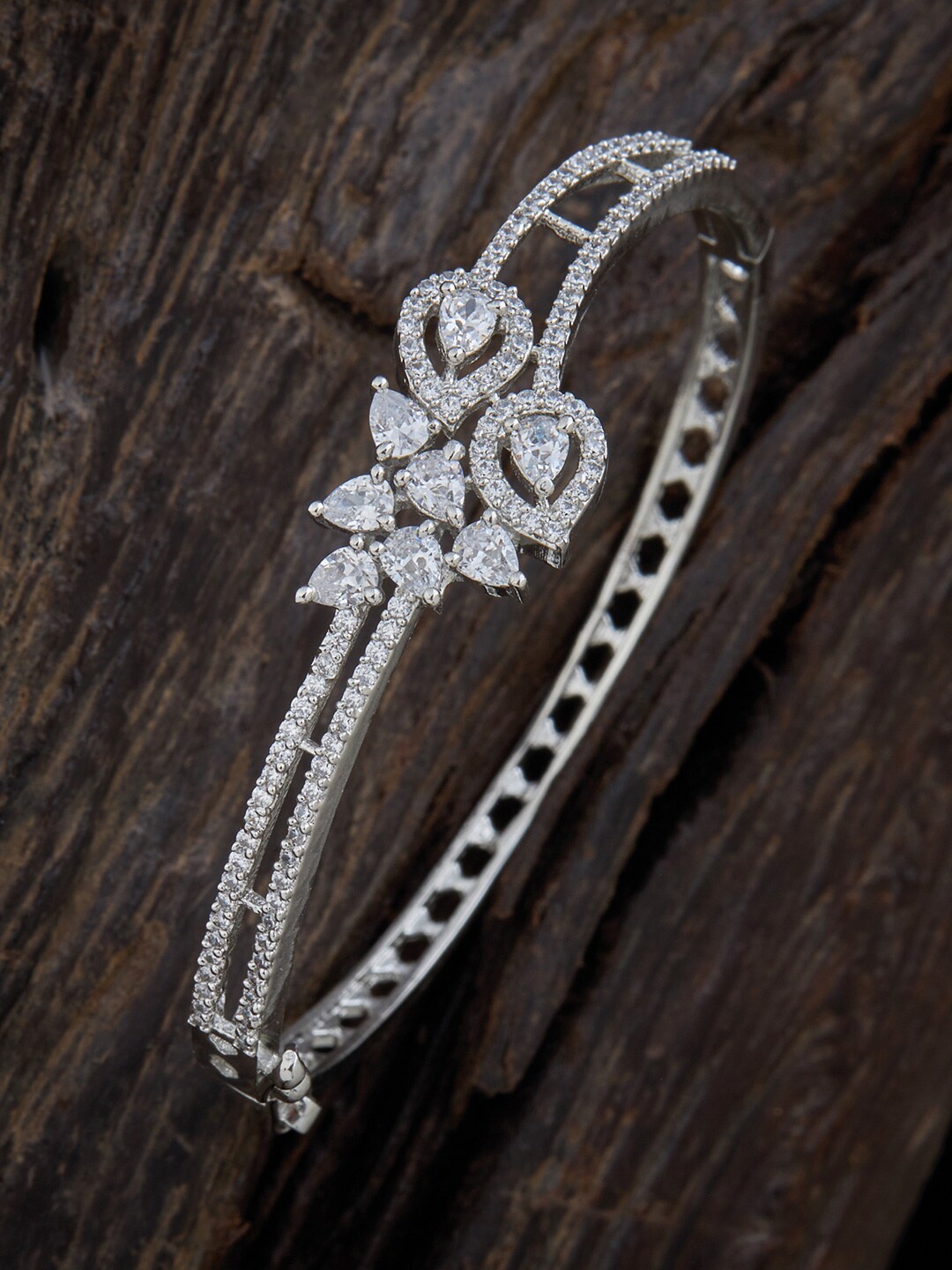 

Kushal's Fashion Jewellery Women Silver-Toned & White Rhodium-Plated Kada Bracelet