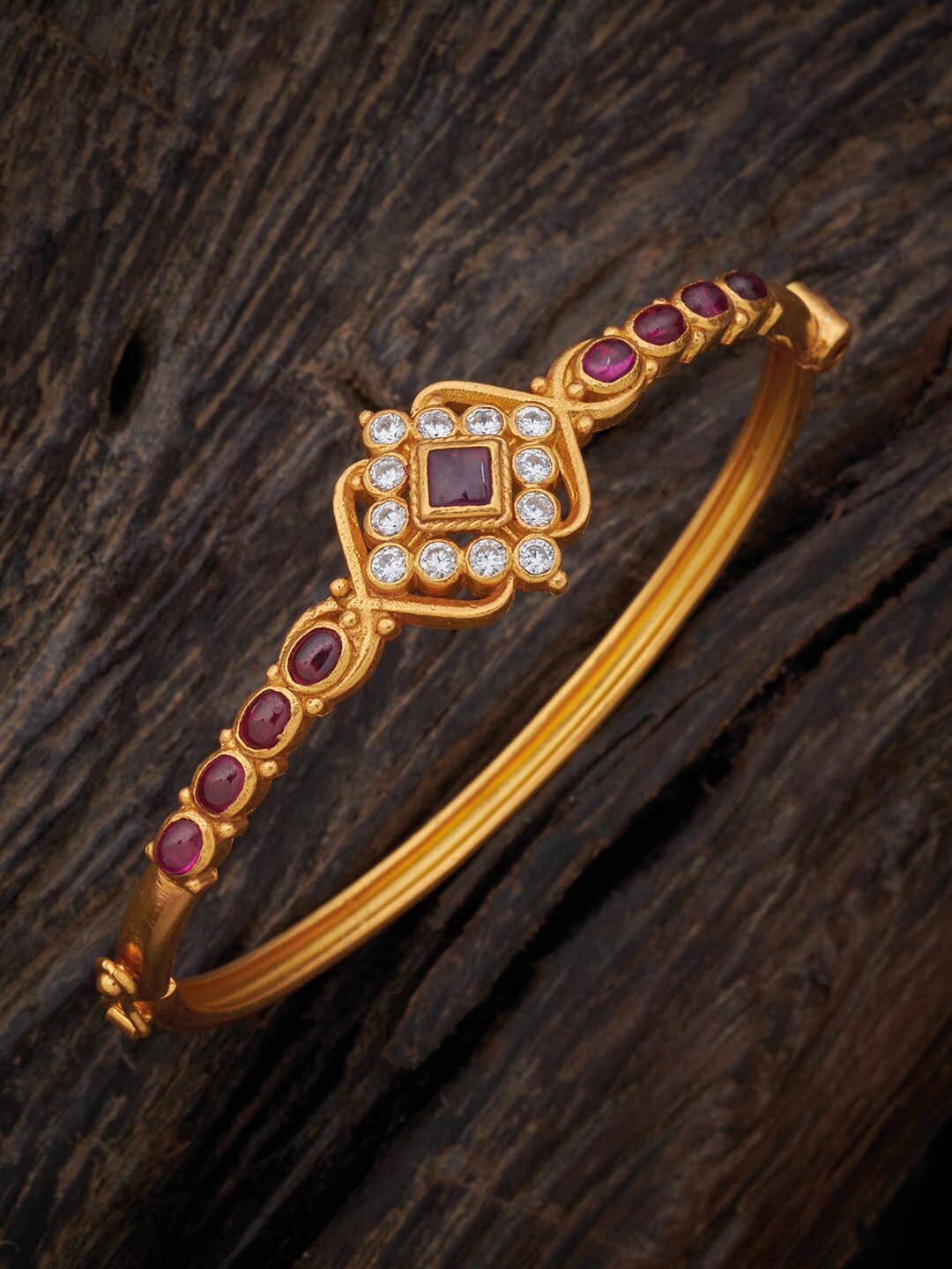 

Kushal's Fashion Jewellery Women Gold-Toned & Pink Silver Kada Bracelet