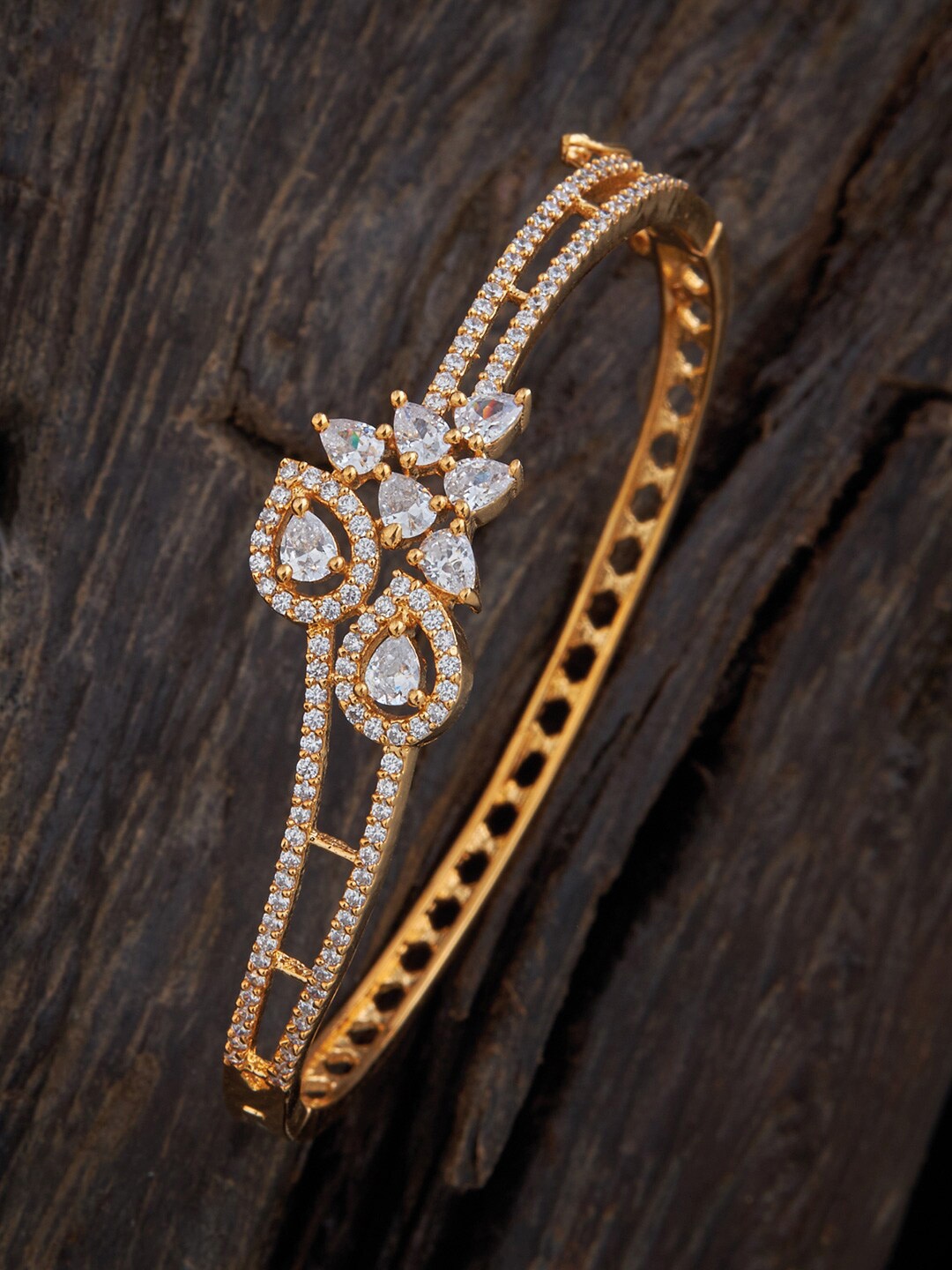 

Kushals Fashion Jewellery Women Gold-Toned & White Gold-Plated Kada Bracelet