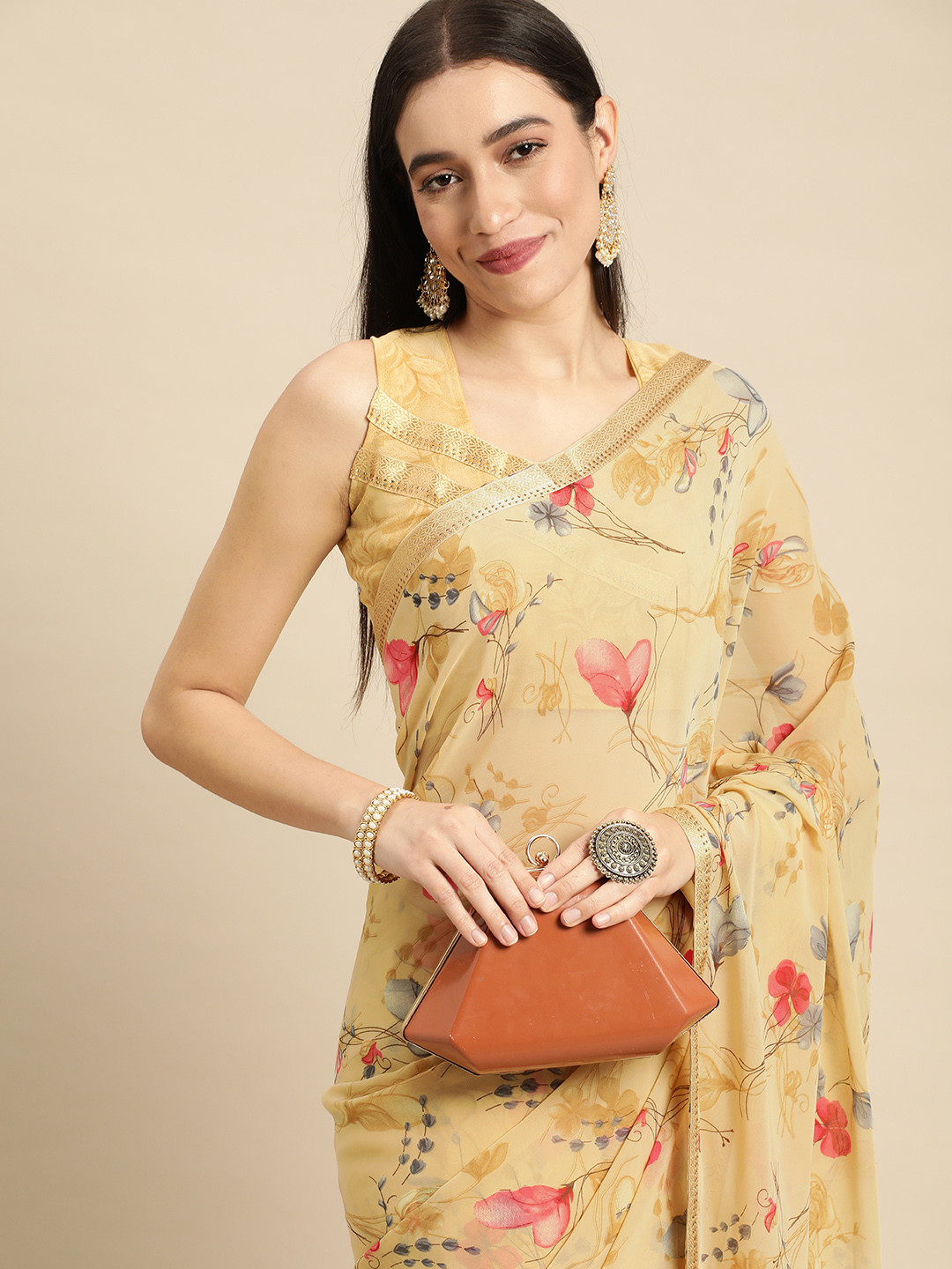 

Mitera Yellow Floral Pure Georgette Saree