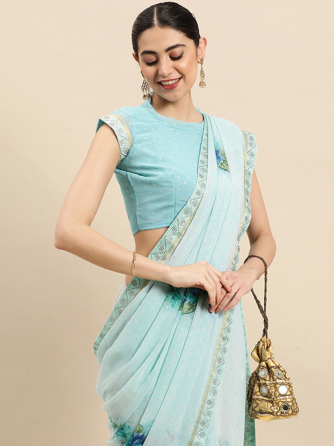 

Mitera Floral Sequinned Pure Georgette Saree, Turquoise blue