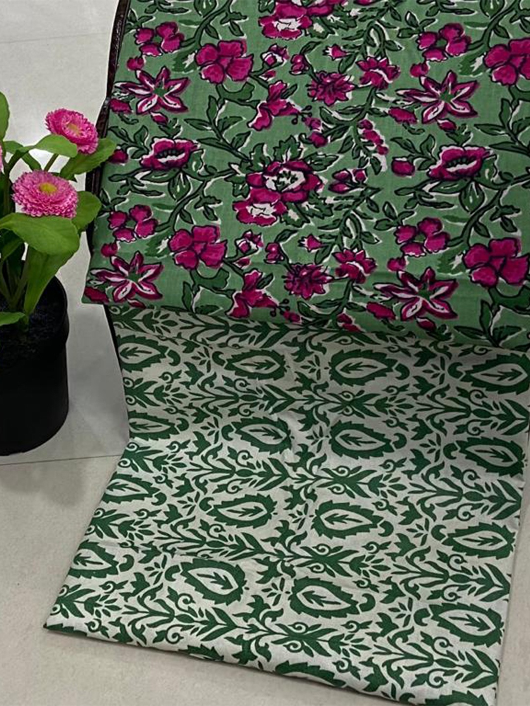 

SALWAR STUDIO Green & Pink Printed Pure Cotton Unstitched Dress Material