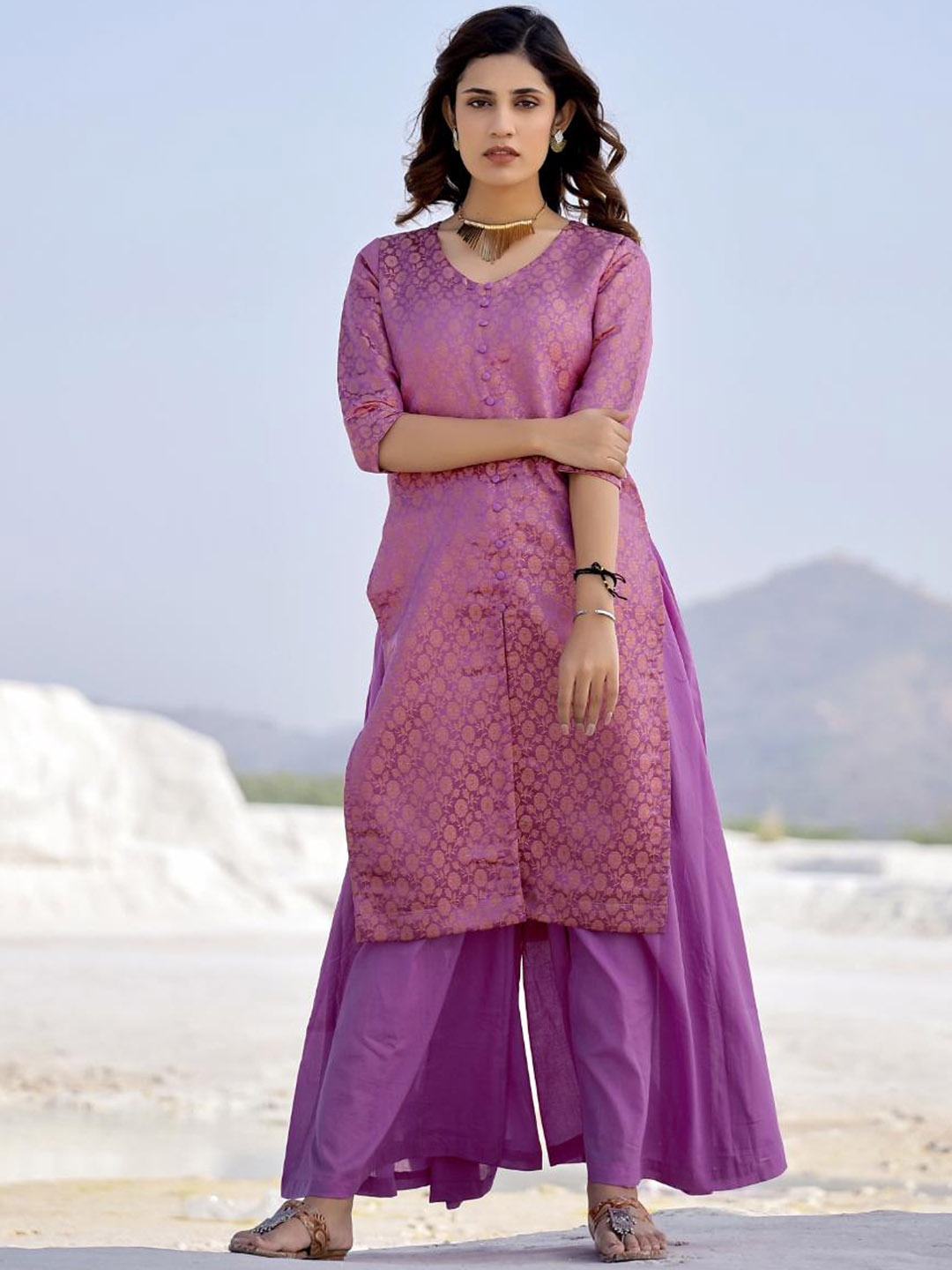 

Baisacrafts Women Mauve Floral Brocade Kurta with Palazzo