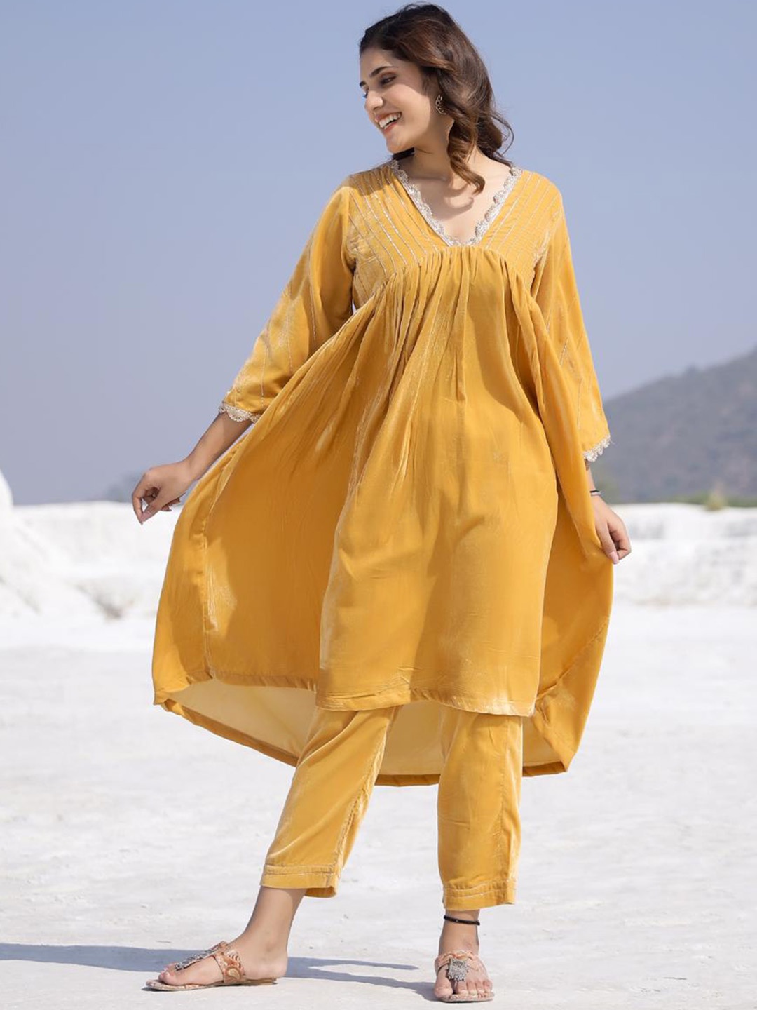 

Baisacrafts Women Mustard Yellow Gotta Patti Velvet Kurta with Trouser Set