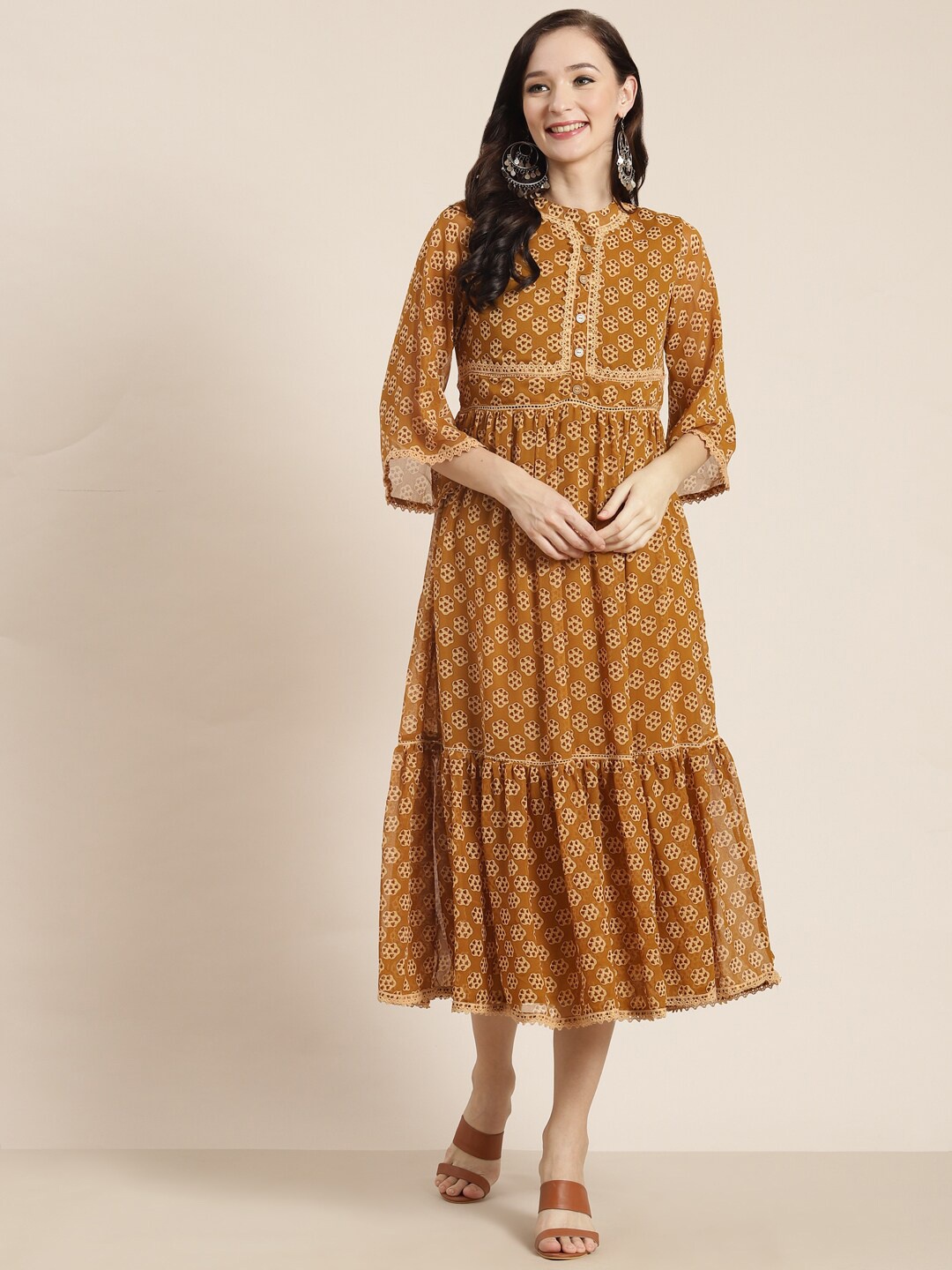 

Juniper Women Brown Printed Georgette Flared Midi Length Ethnic Dresses