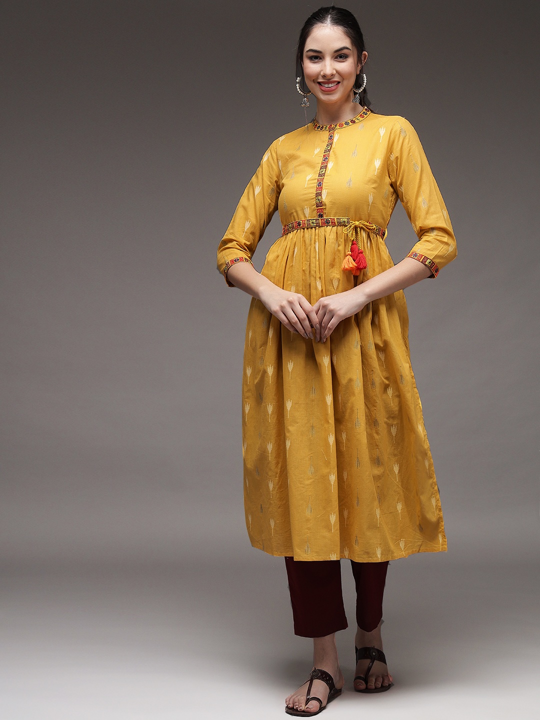 

Nehamta Band Collar Floral Thread Work Straight Regular Fit Cotton Kurta, Mustard