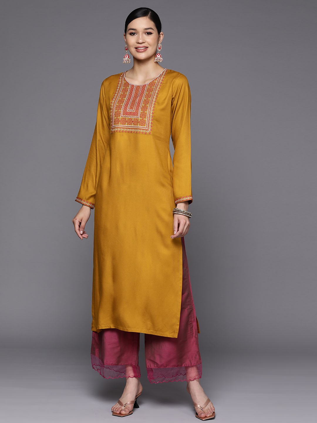 

Libas Women Mustard Yellow Pashmina Wool Floral Embroidered Yoke Detail Straight Kurta
