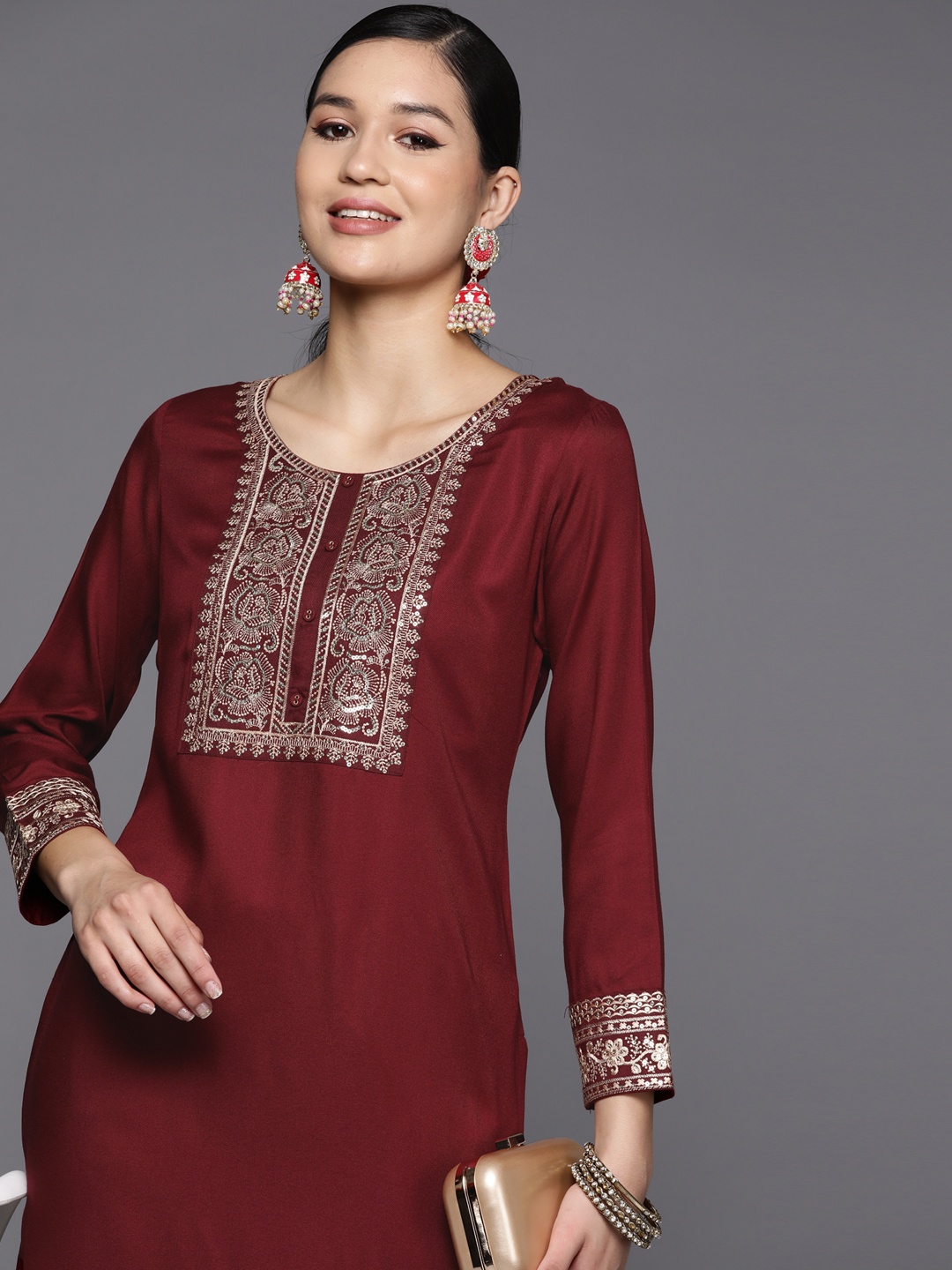 

Libas Women Maroon Pashmina Wool Floral Embroidered Yoke Detail Straight Kurta