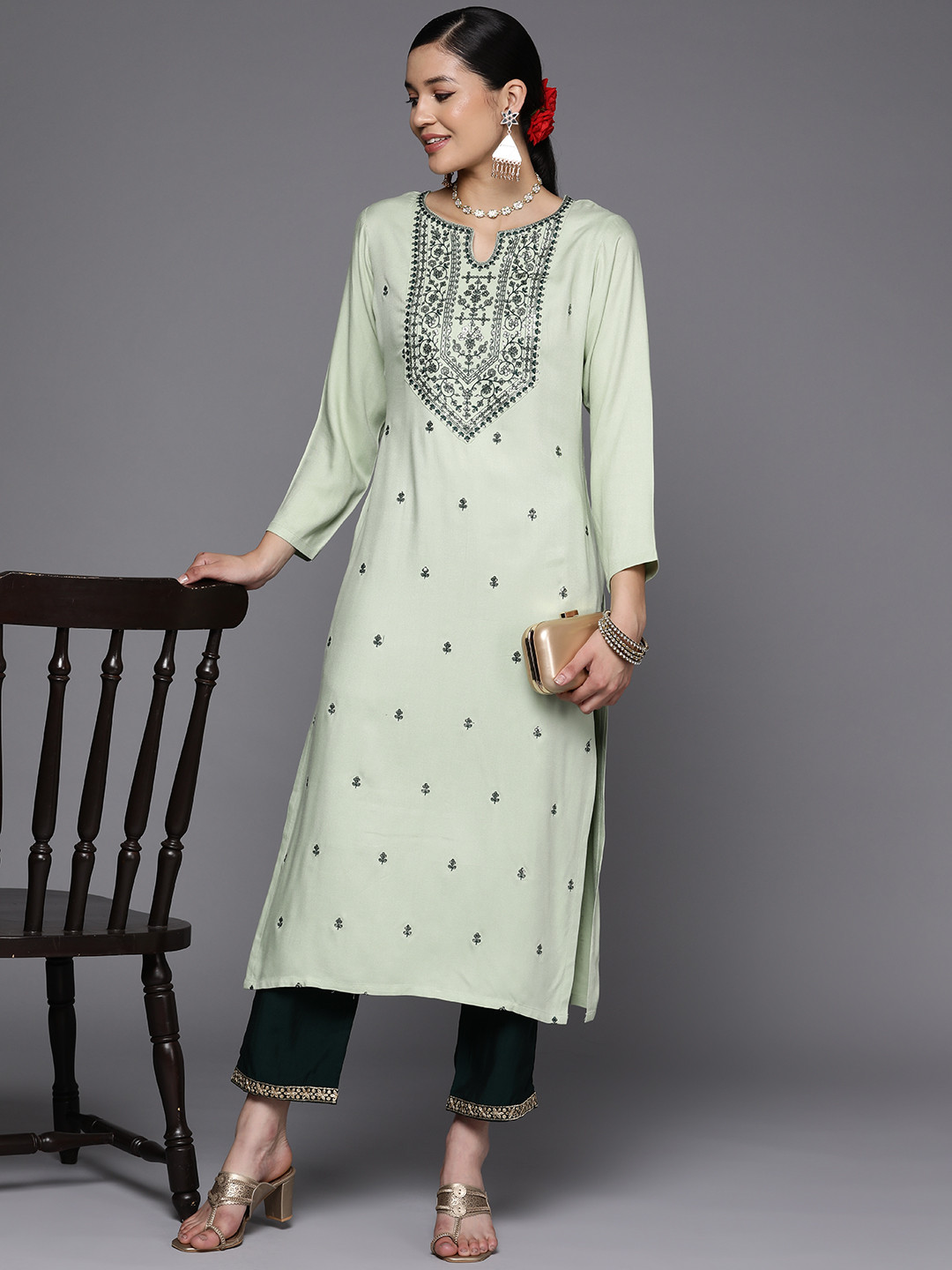 

Libas Green Pashmina Wool Floral Sequins Embroidered Yoke Detail Straight Kurta