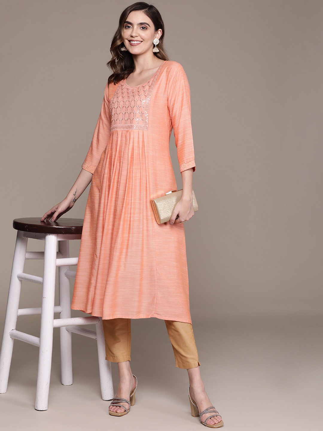 

Anubhutee Peach & Silver Ethnic Motifs Embroidered A-Line Kurta