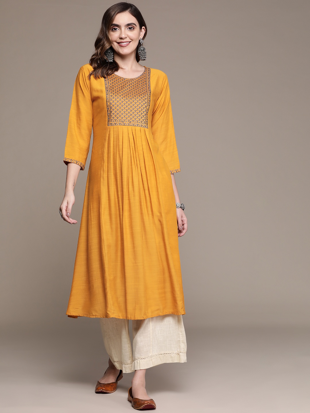 

Anubhutee Yellow Ethnic Motifs Embroidered A-Line Kurta