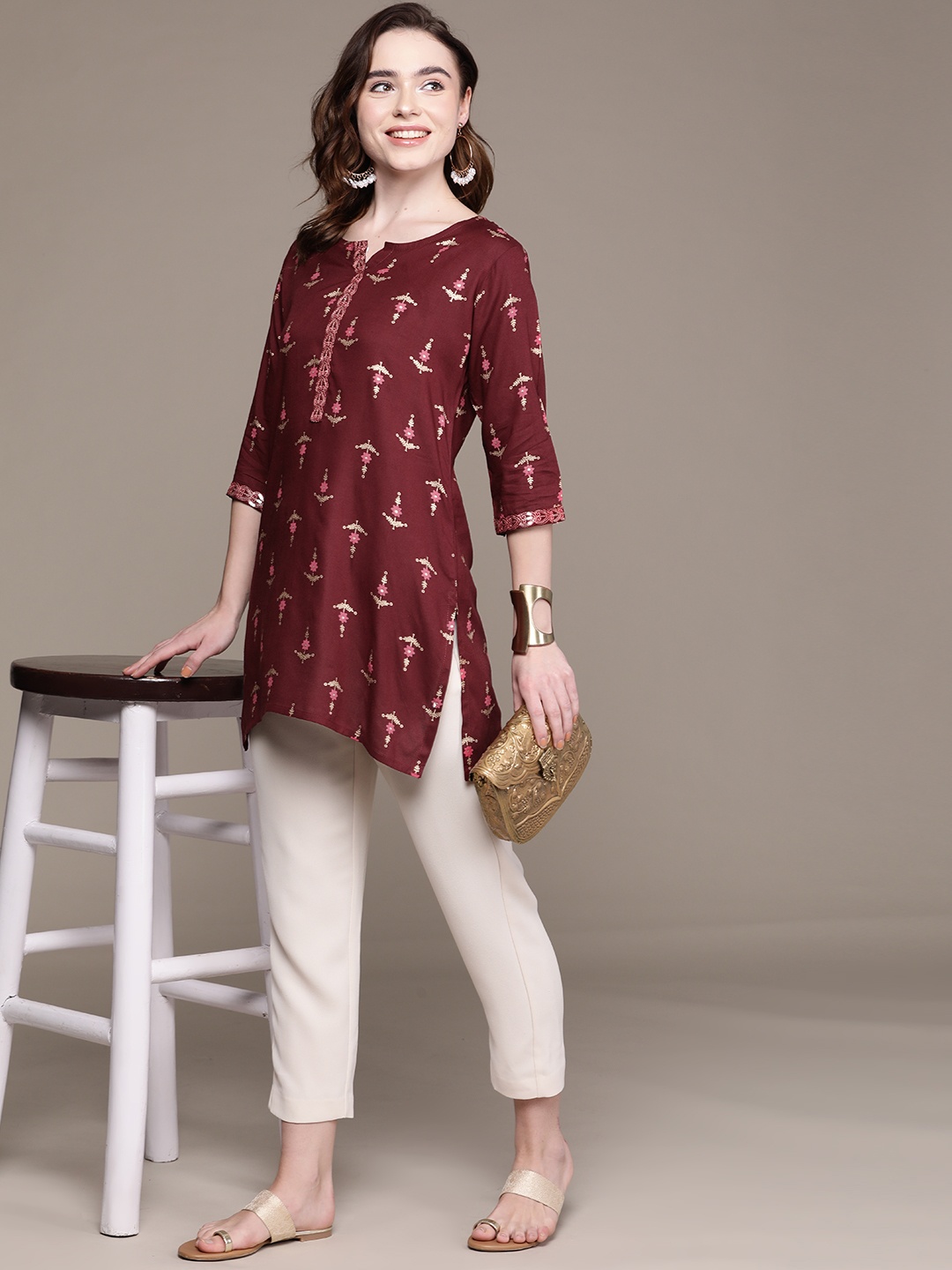 

Anubhutee Maroon & Off White Ethnic Motifs Printed Kurti