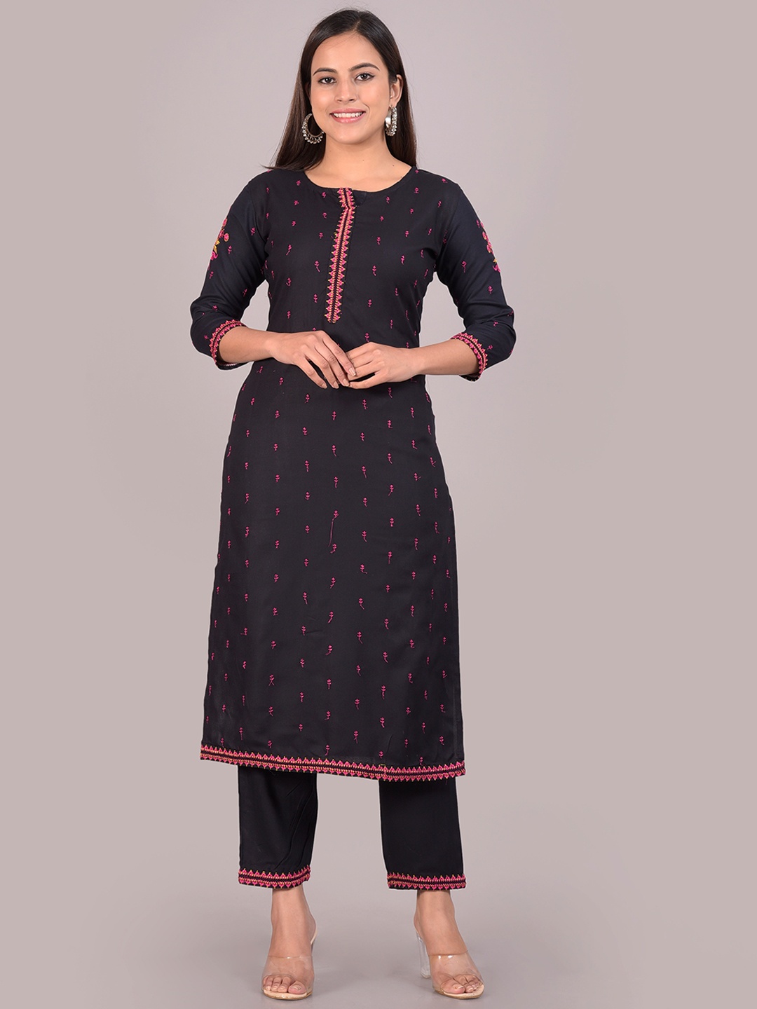 

Senyora Women Navy Blue Ethnic Motifs Embroidered Kurta With Trousers