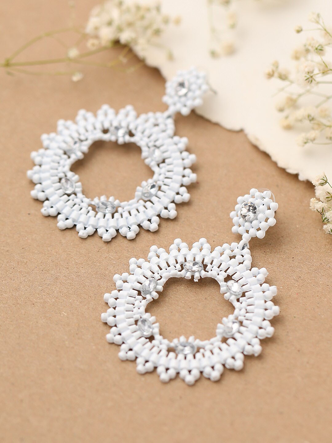 

SOHI White Contemporary Gold Plated Drop Earrings