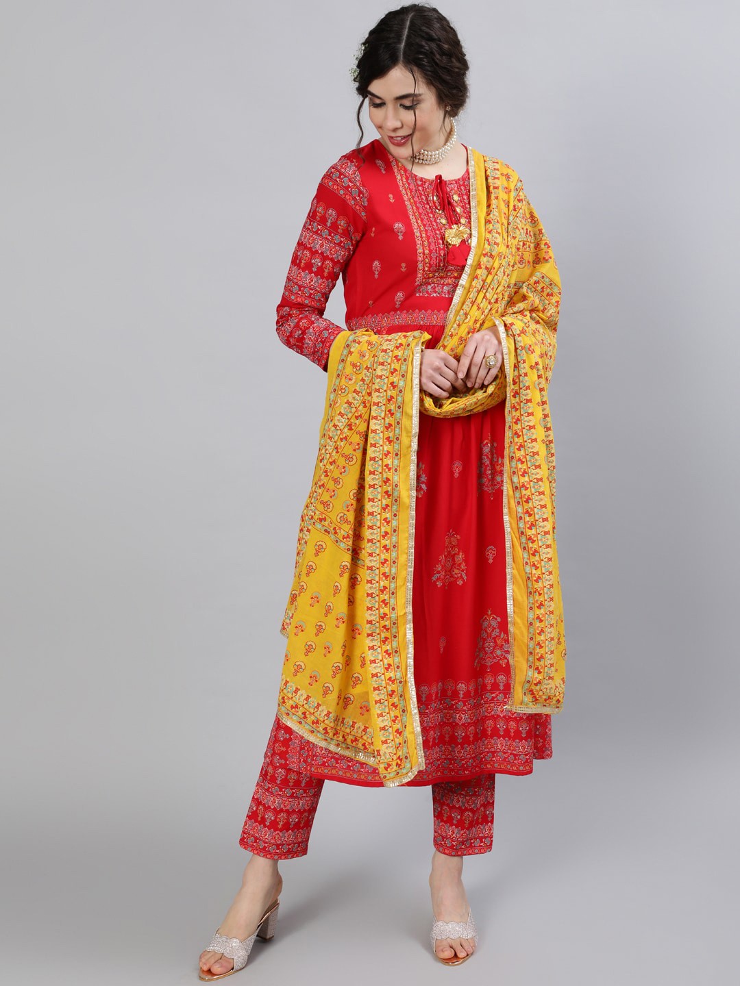 

INDIE CLOSET Women Red & Yellow Embroidered A-Line Kurta with Trousers & With Dupatta