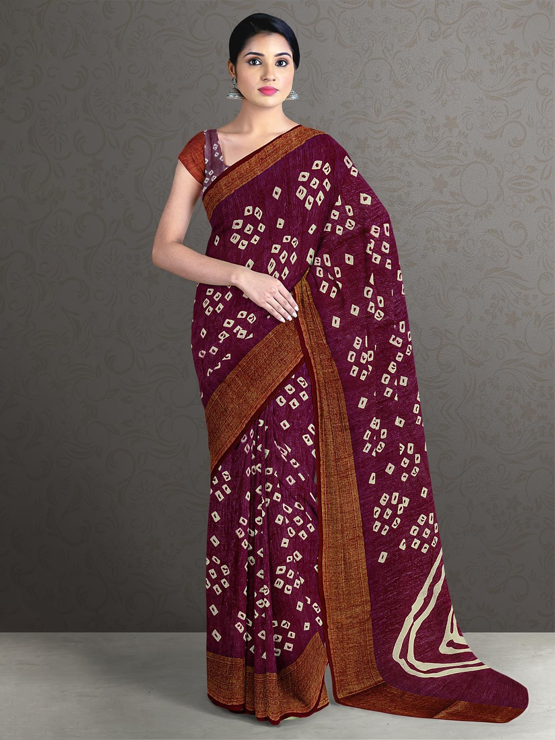 

Kalamandir Magenta & White Bandhani Printed Saree