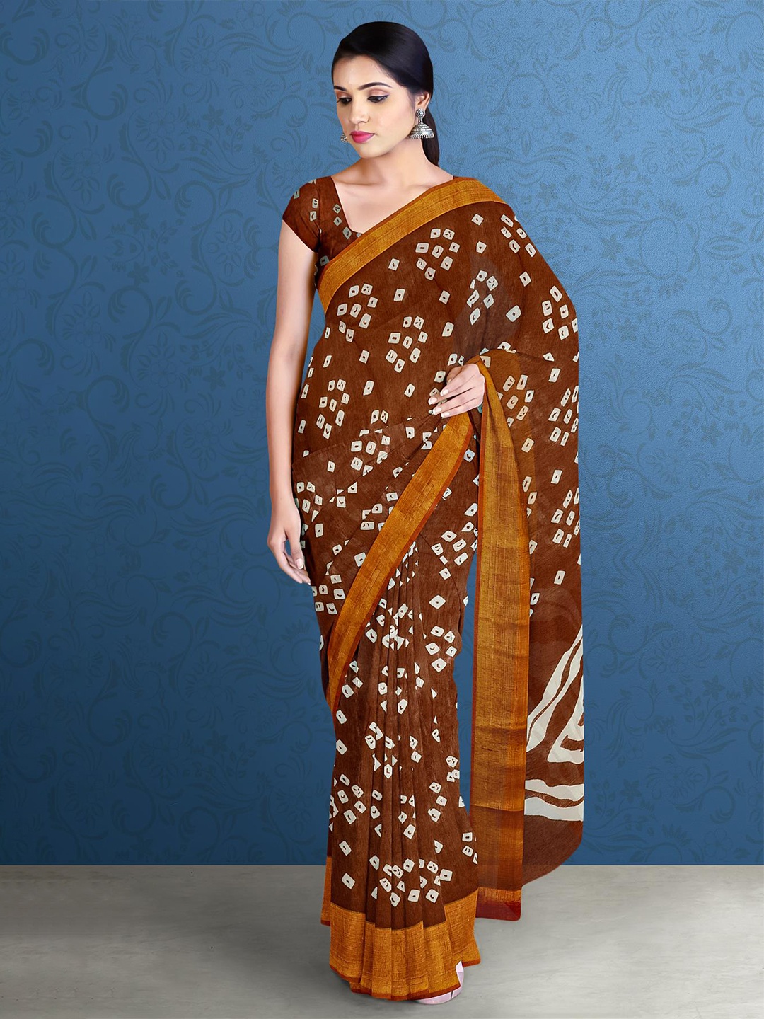 

Kalamandir Brown & White Geometric Saree