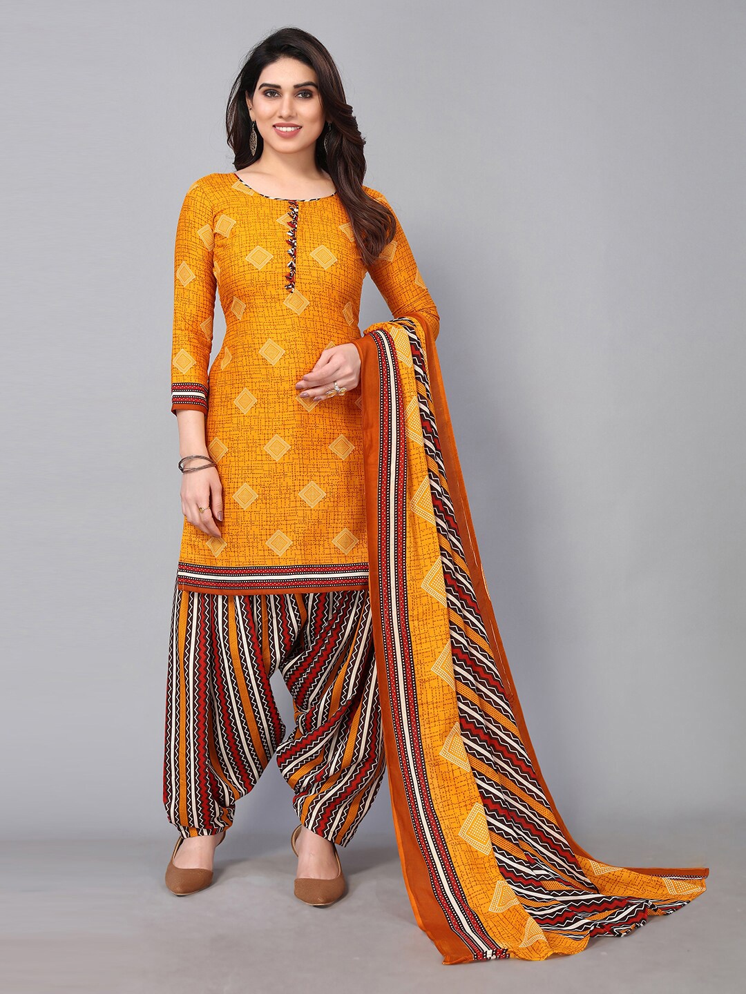 

KALINI Mustard & Red Printed Unstitched Dress Material