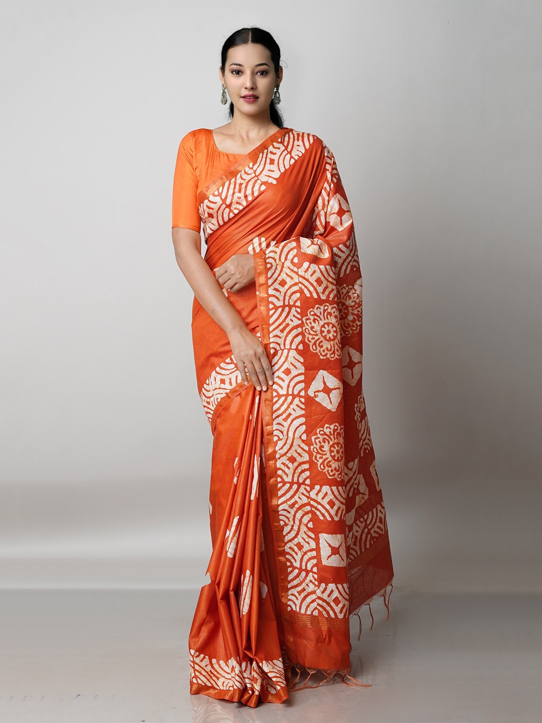 

Unnati Silks Orange & Off White Batik Zari Pure Silk Handloom Chanderi Saree