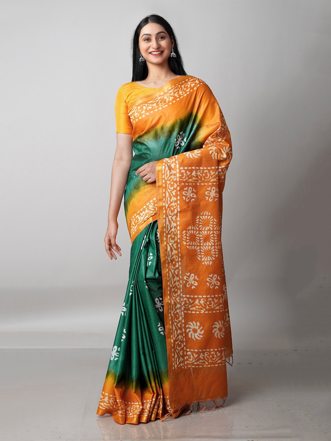 

Unnati Silks Green & Mustard Batik Zari Pure Silk Handloom Chanderi Saree