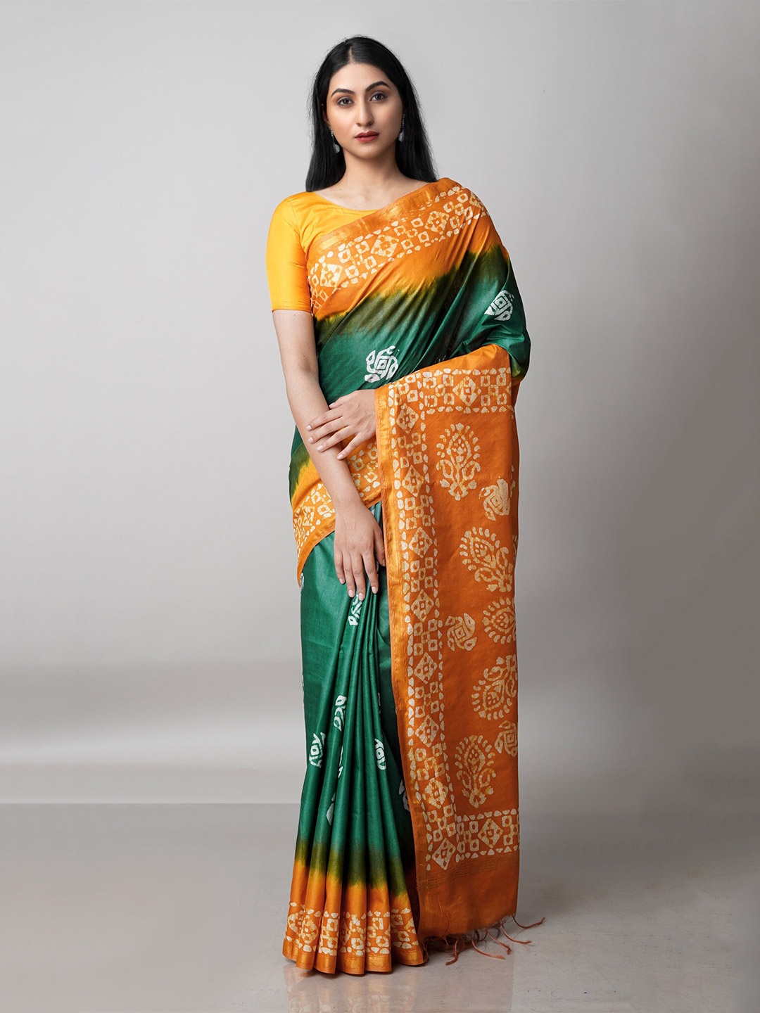

Unnati Silks Green & Mustard Batik Zari Pure Silk Handloom Chanderi Saree