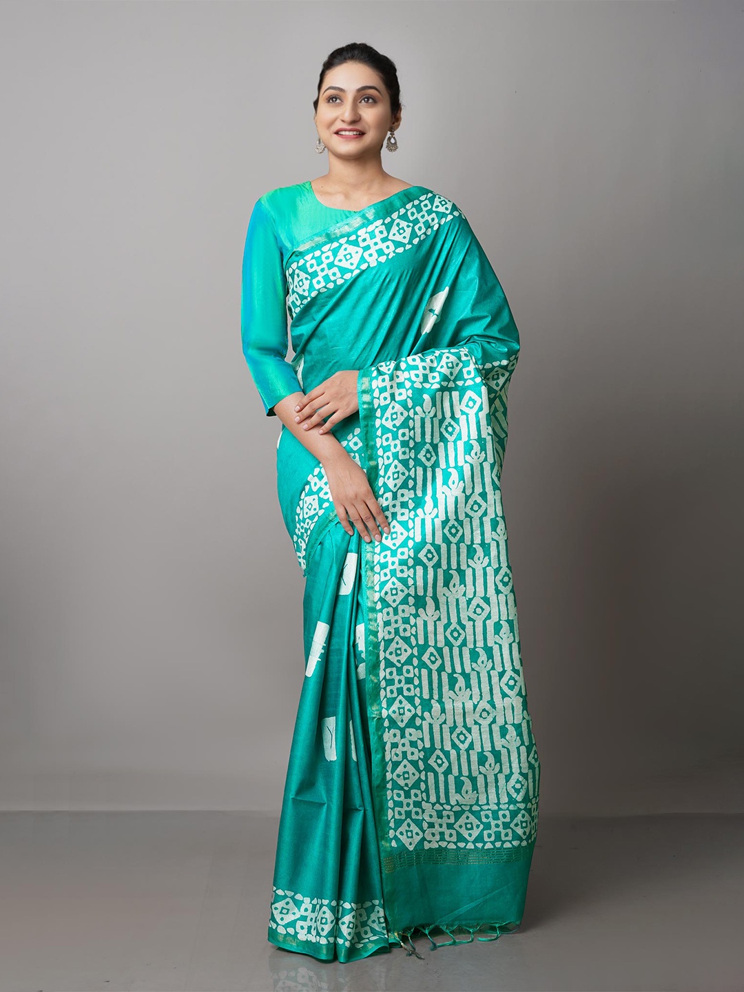

Unnati Silks Green & White Batik Zari Pure Silk Pure Silk Chanderi Saree