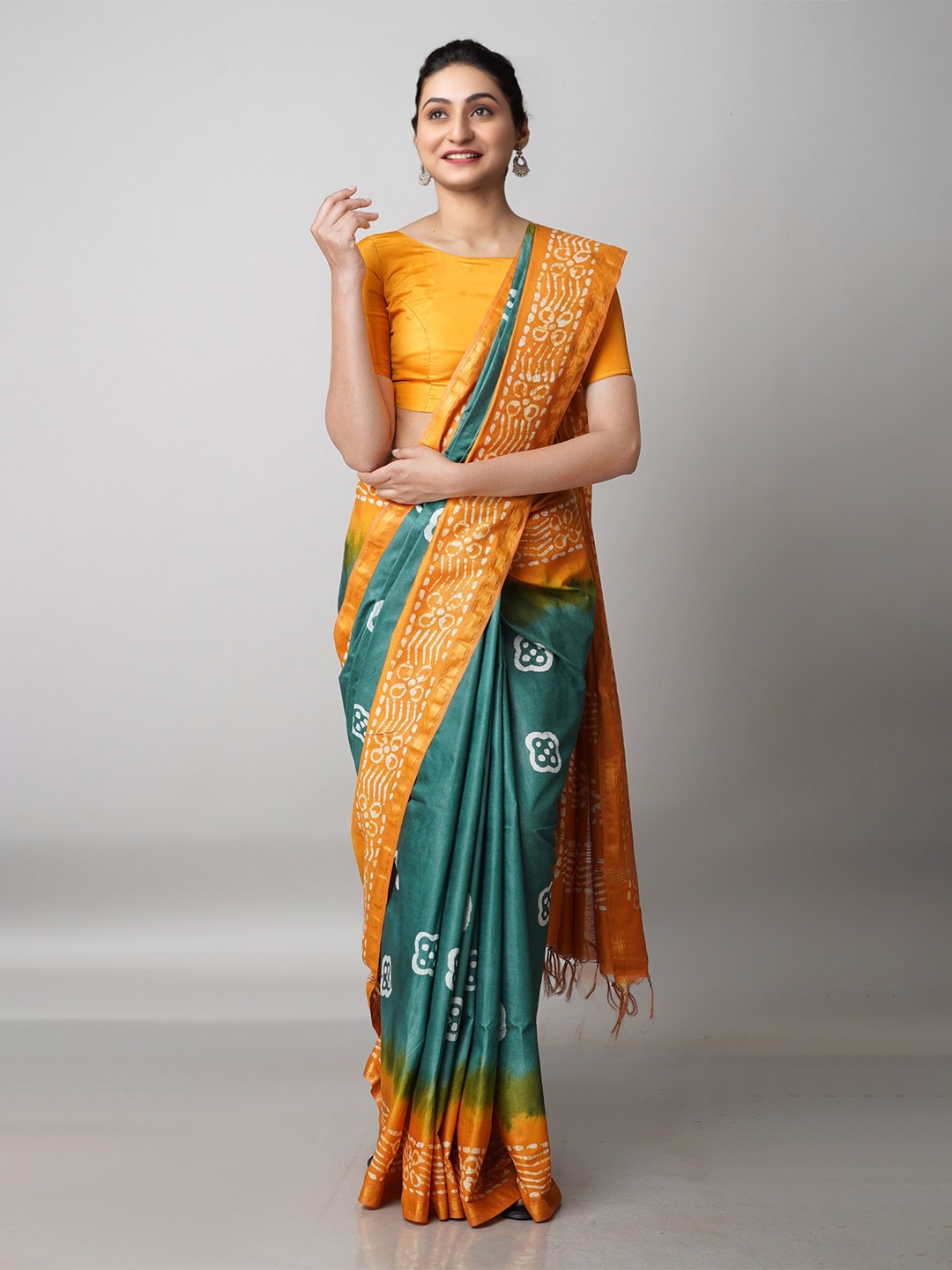 

Unnati Silks Green & Mustard Batik Zari Pure Silk Handloom Chanderi Saree