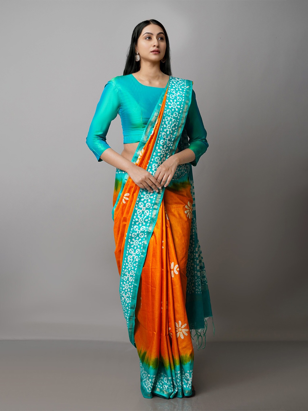 

Unnati Silks Orange & Blue Batik Zari Pure Silk Handloom Chanderi Saree